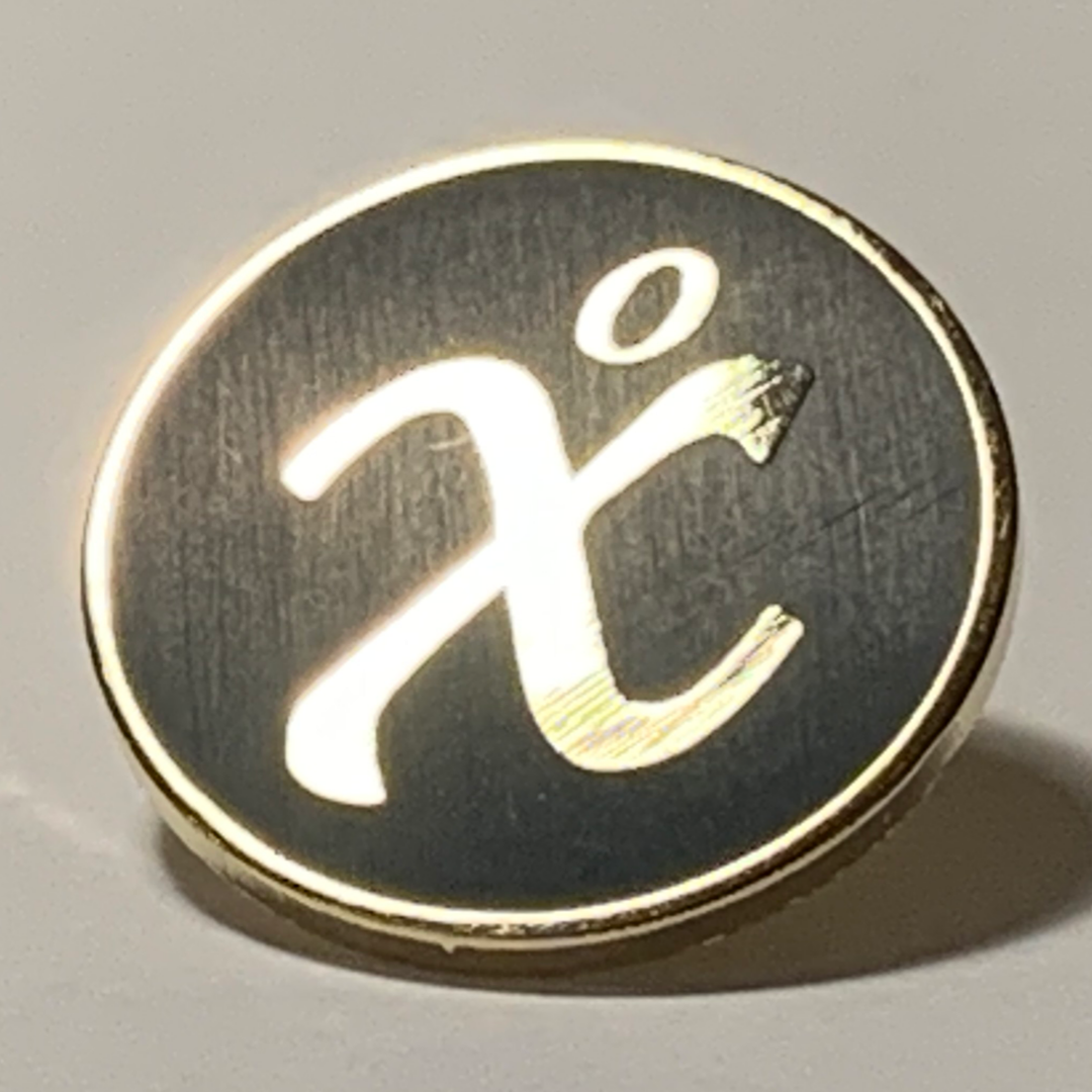 Badge in gold