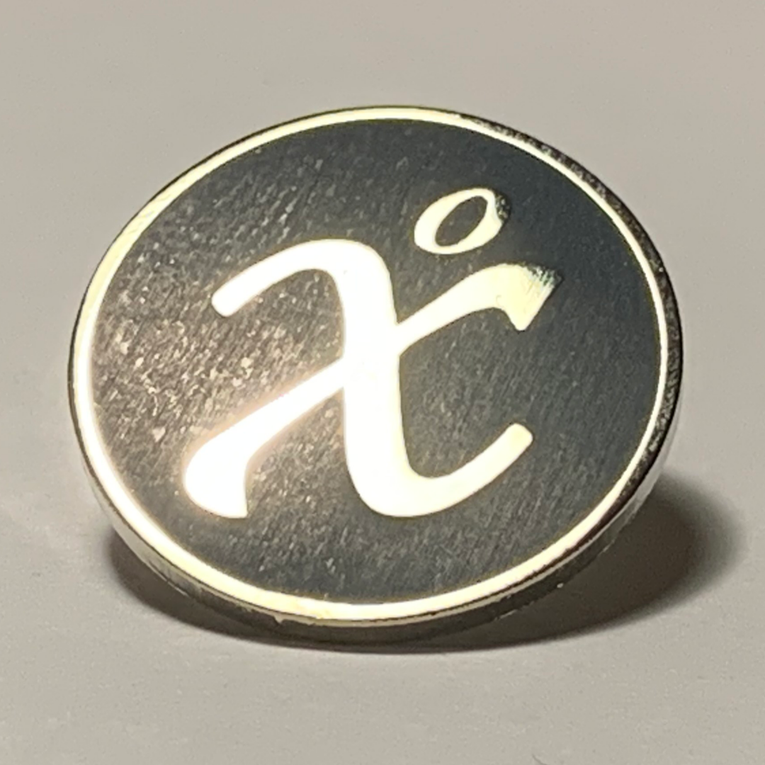 Badge in nickel